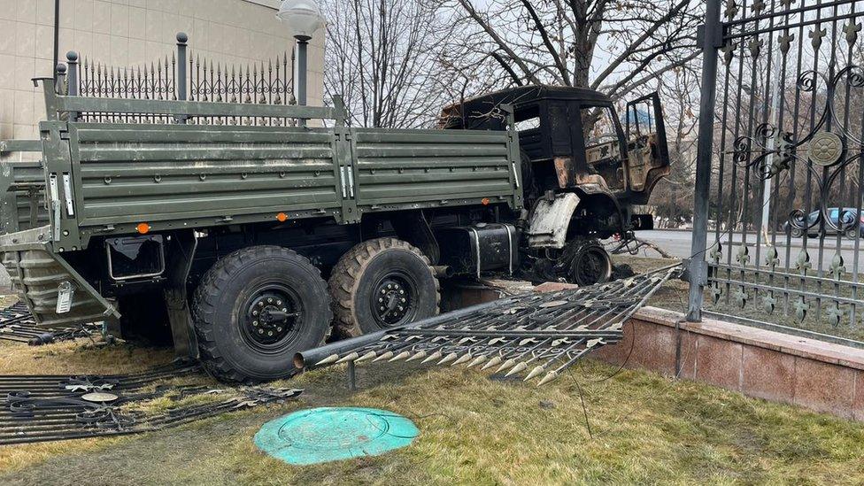 A truck driven into a gate in Almaty