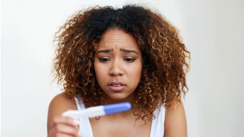 Woman find out she is pregnant using a test