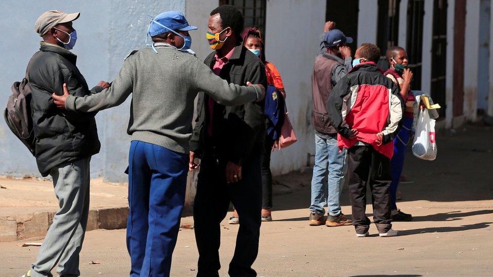 A policeman turns away people from the city centre ahead of planned anti-government protests during the coronavirus disease (COVID-19) outbreak in Harare, Zimbabwe, July 30, 2020