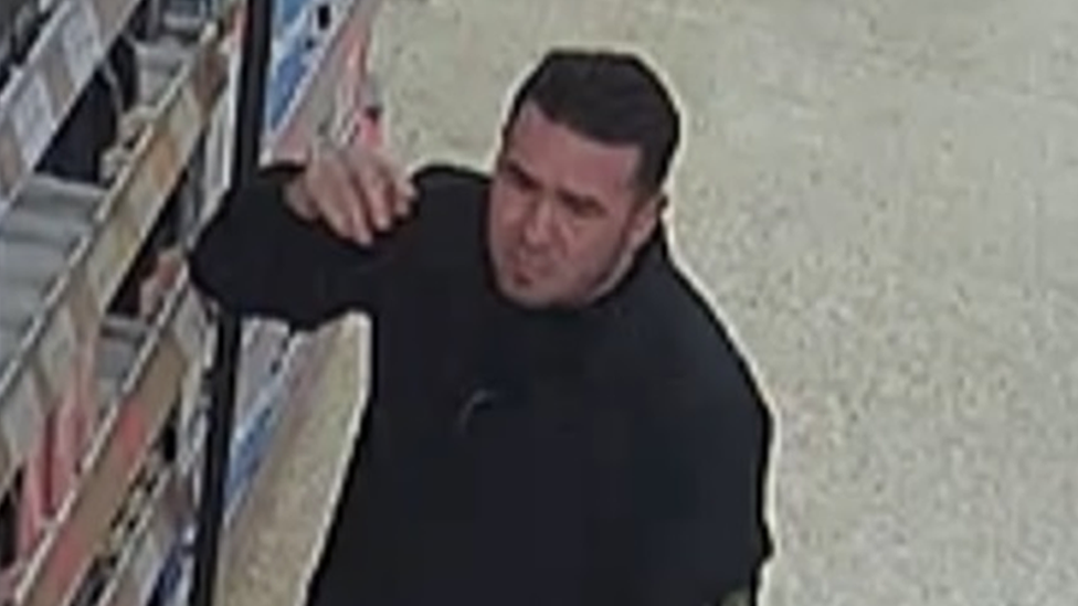 Man wanted over champagne theft