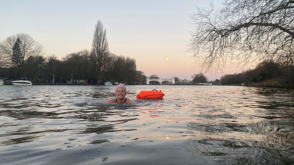 Picture of Dinah swimming in open water