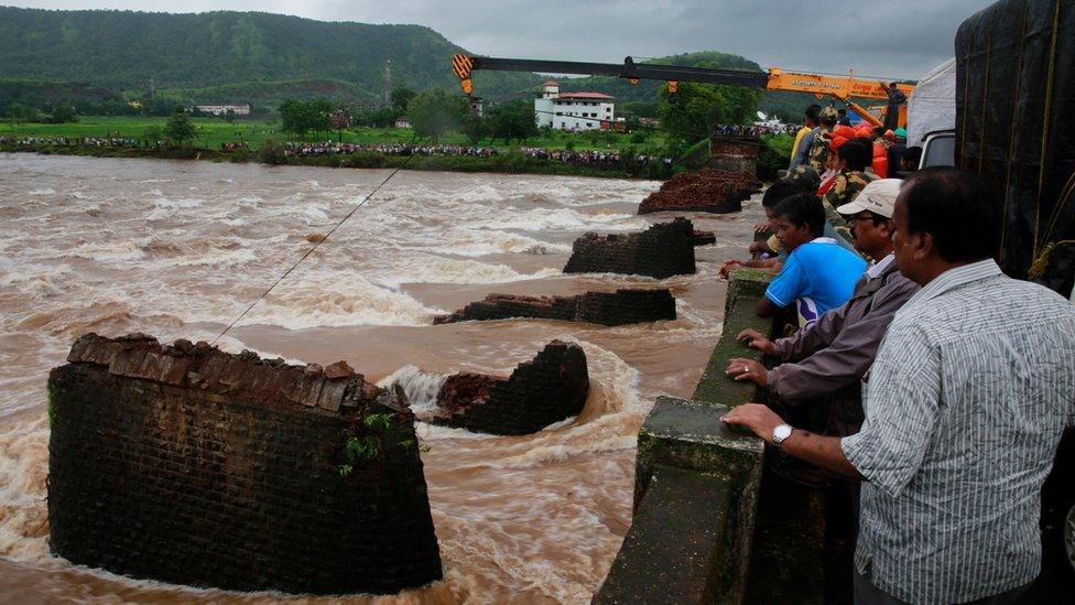 Bystanders watch rescue operations