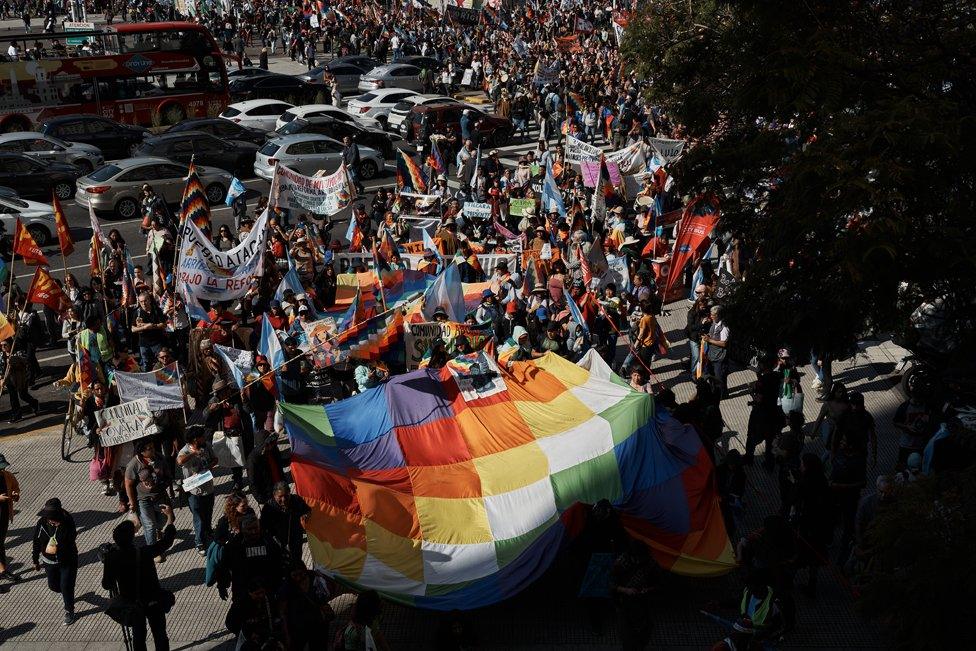 Members of indigenous communities that arrived from northern Argentina, march together with activists and social organizations through downtown Buenos Aires, in defence of water and their land rights and against the controversial reform backed by Governor Morales, on August 1, 2023, in Buenos Aires, Argentina