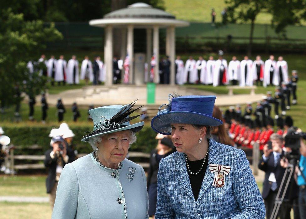 The Queen at the Magna Carta meadow in 2015 talking to public official Sarah Goad