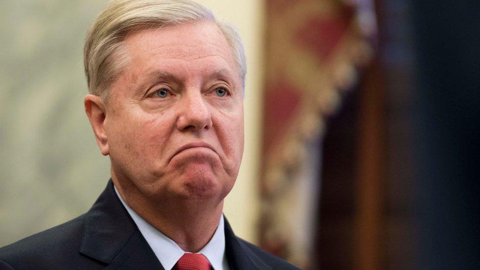 Republican Lindsey Graham frowns.