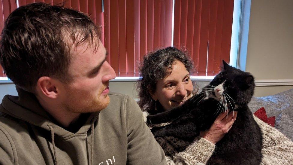 Rescuer Seth Masters pictured with Princess and her owner Sonia Wilkinson