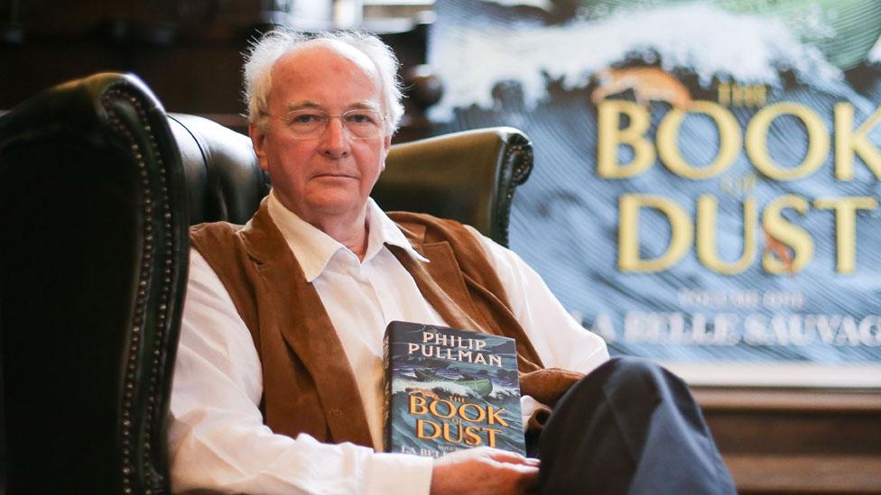 British author Philip Pullman poses with a copy of La Belle Sauvage: The Book of Dust Volume One in, 2017