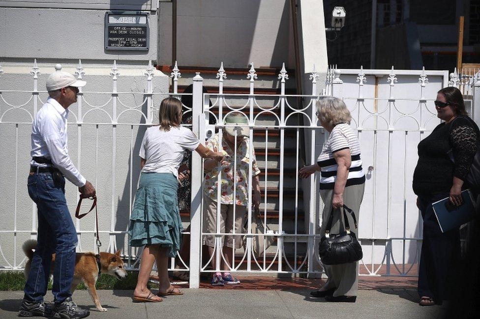 People wait in line to enter the Russian consulate on 1 September 2017 in San Francisco, California.