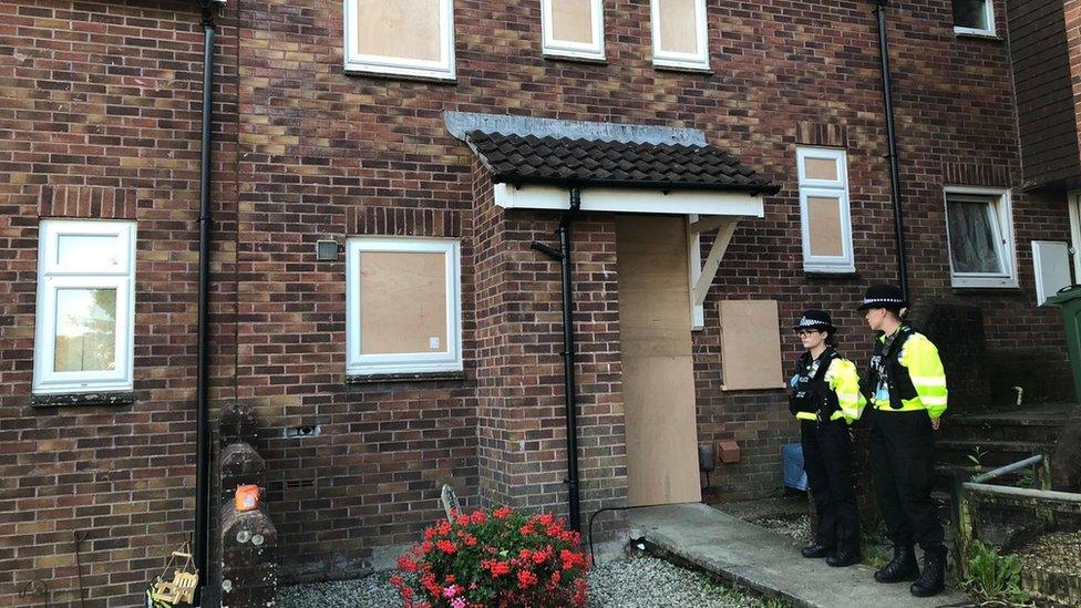 Police officers outside 17 Biddick Drive