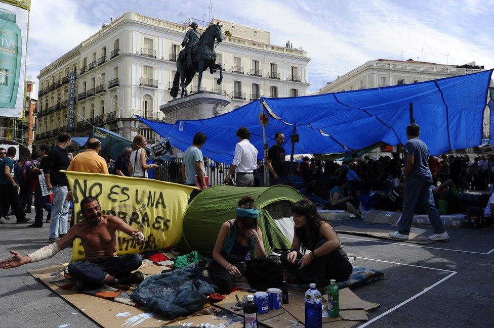 Protesters gather at the Puerta del Sol square in Madrid in May 2011 to demonstrate against Spain's economic crisis