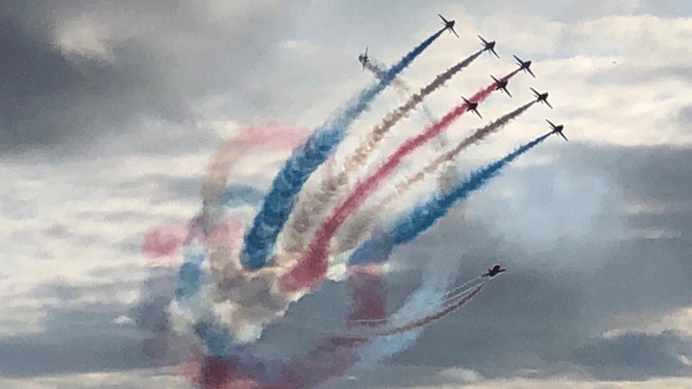 Red arrows display at airshow