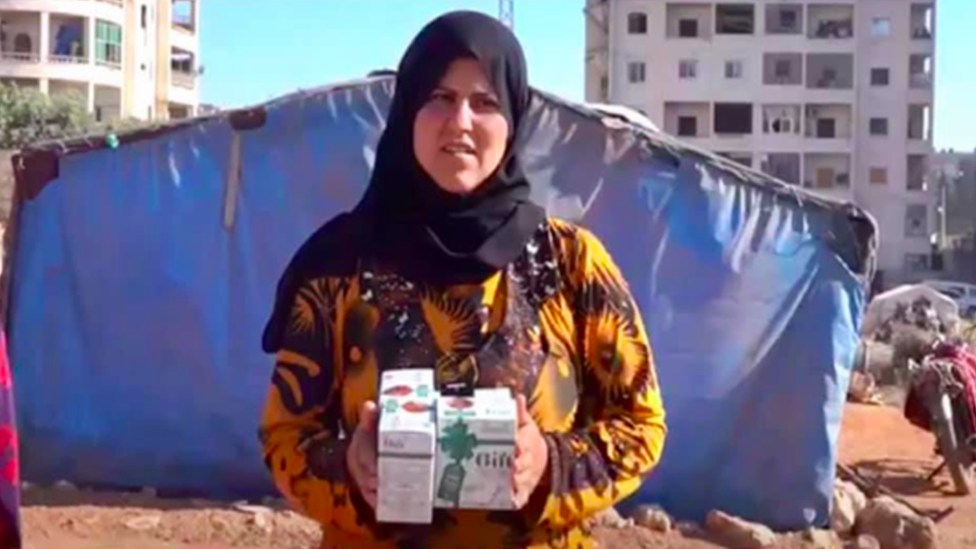 Syrian woman receives pads