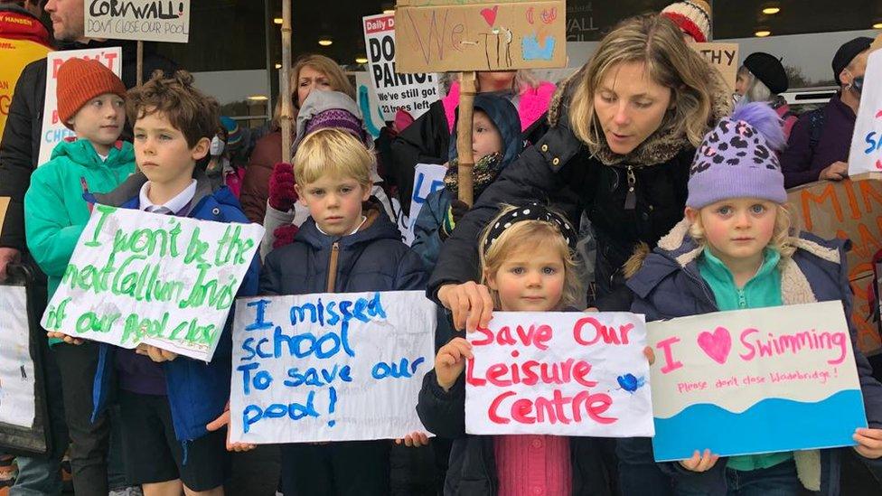 Protestors with signs