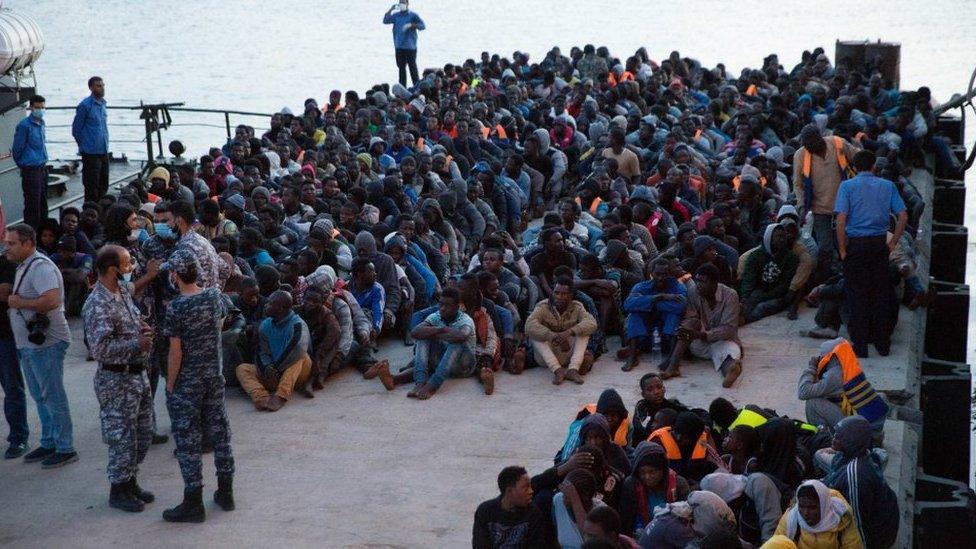 African migrants, who were rescued by the Libyan coastguard in the Mediterranean off the Libyan coast, arrive at a naval base in Tripoli, Libya, on 26 May 2017