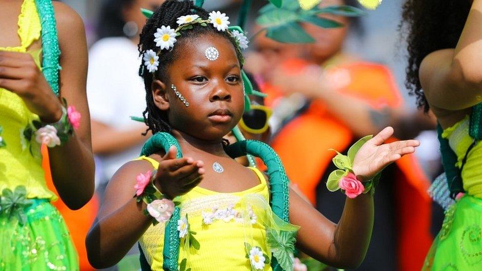 Child performing at Carnival