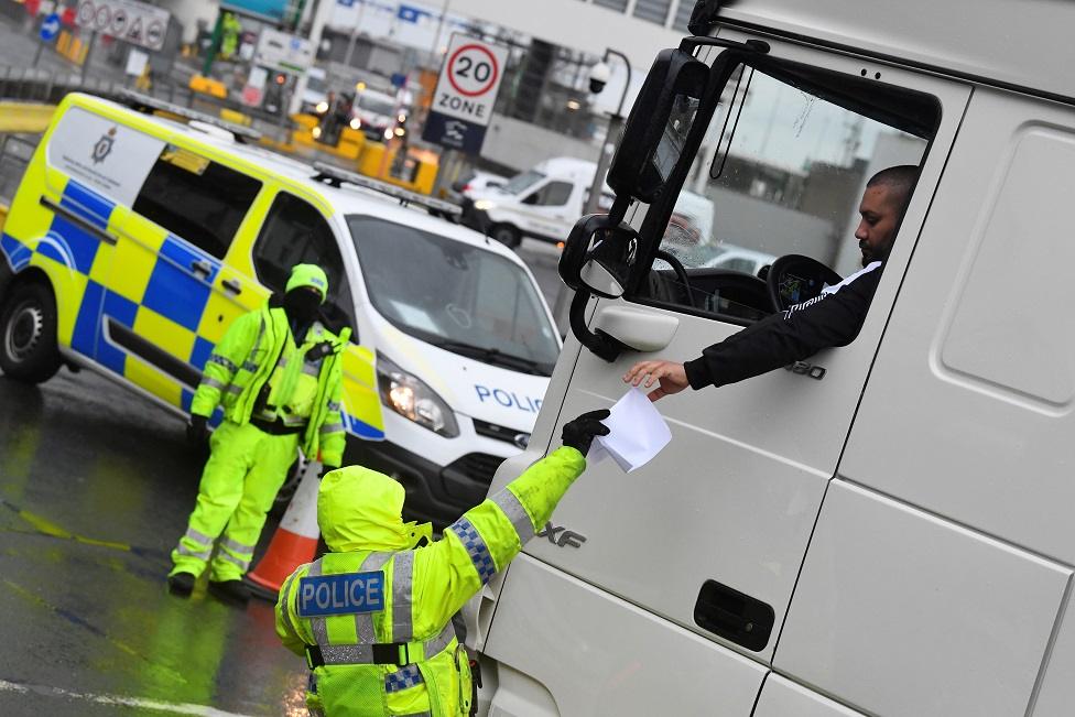 Police check lorry documentation at Dover