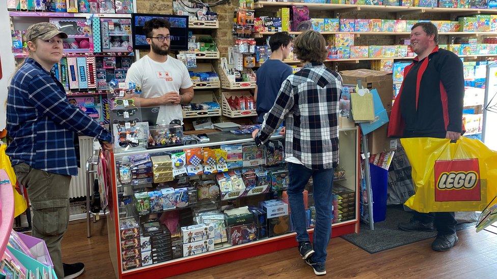 Shoppers in a toy shop