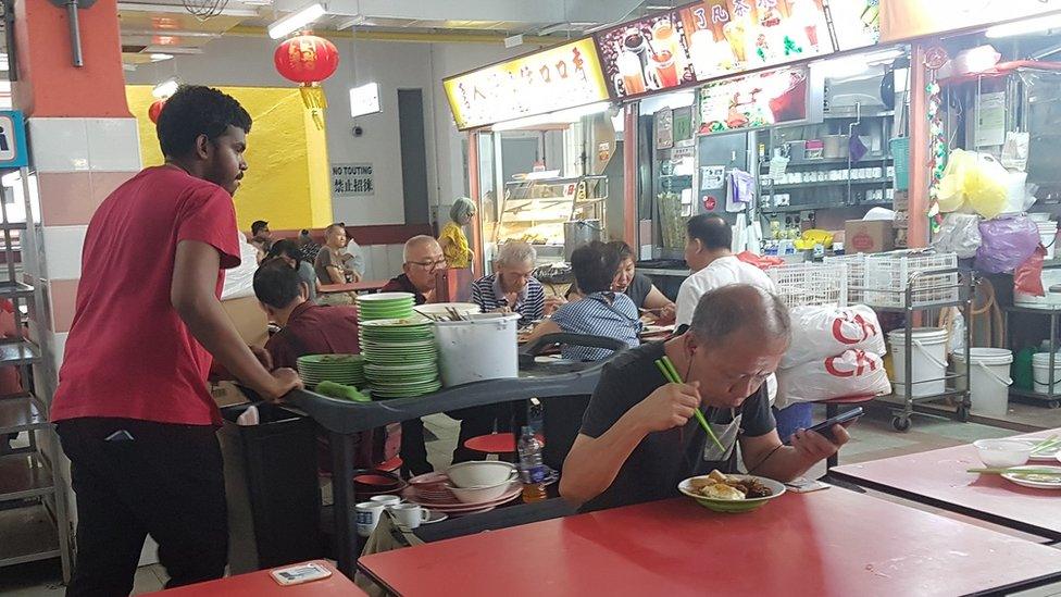 Cleaner in hawker centre