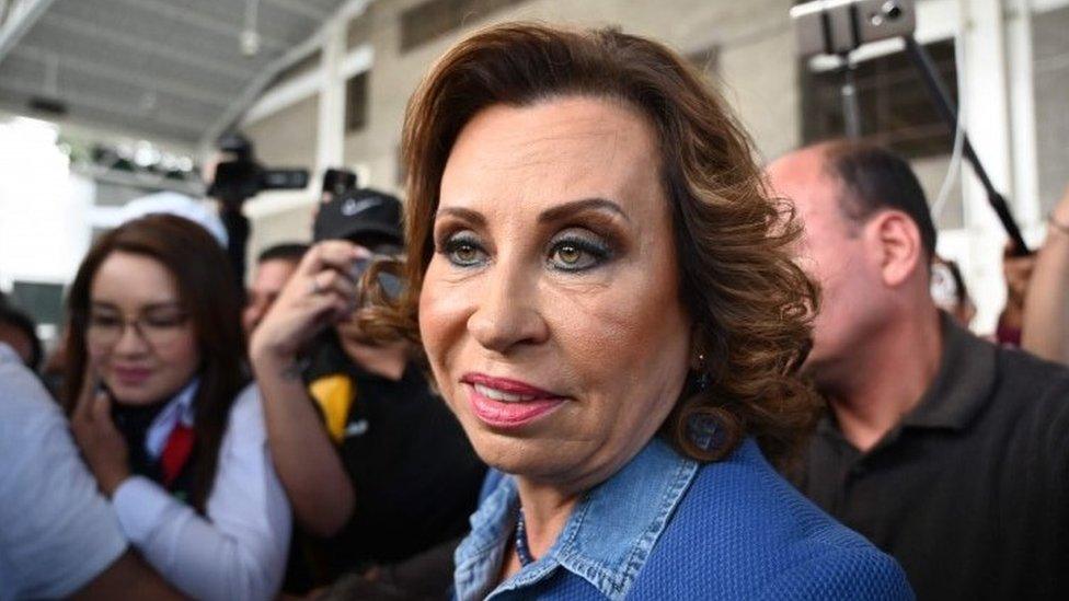 Guatemalan candidate for the National Union of Hope (Union Nacional de la Esperanza) party, Sandra Torres, leaves after voting at a polling station in Guatemala City on August 11, 2019