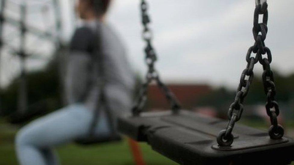 A child on a swing