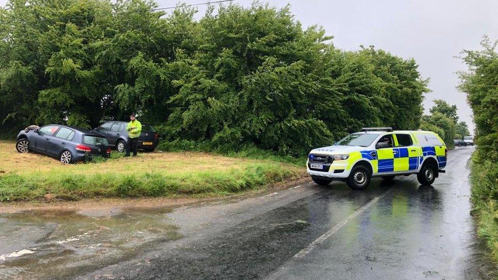 police car blocks road