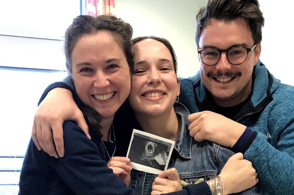 Ellie Hutchinson (centre) is carrying her cousin Olivia's baby which is due in July