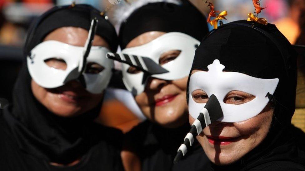 Revellers in Recife dressed up as the Zika mosquito