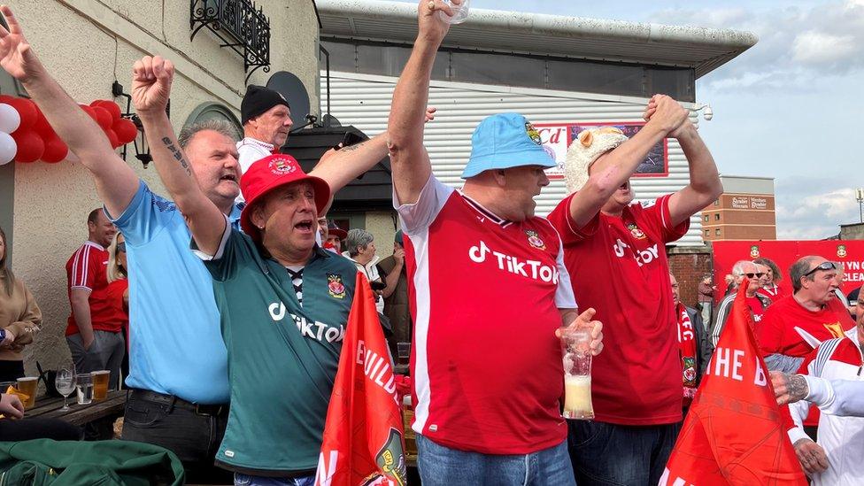 Fans outside The Turf