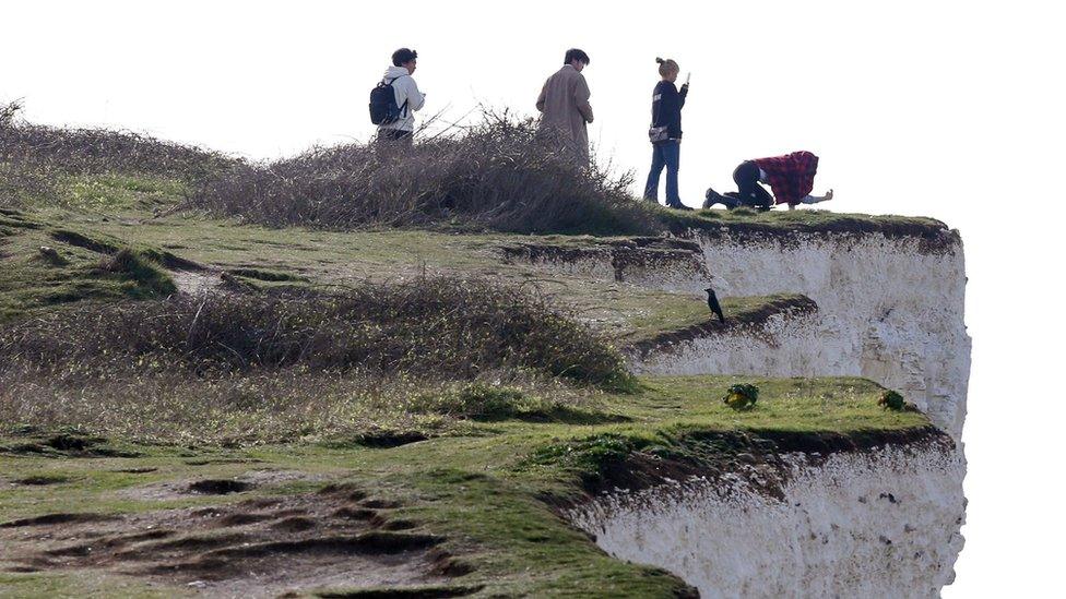 People on Birling Gap