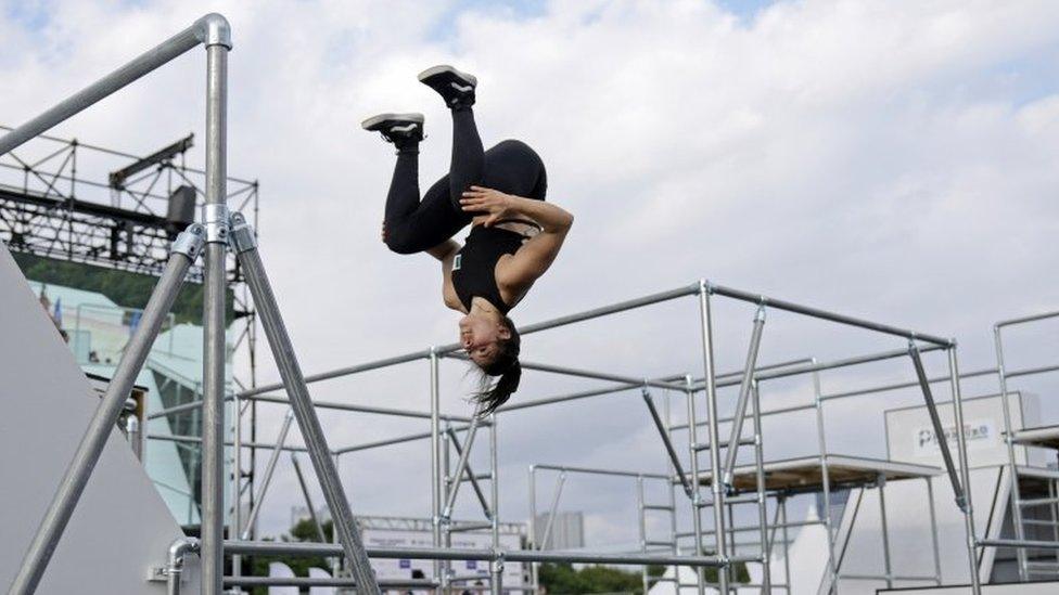 Elle Bucio doing a summersault