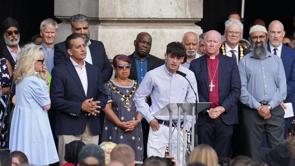 Grace's younger brother addresses the vigil