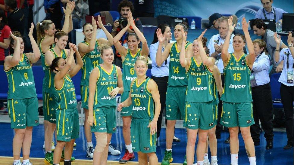 Australia's players celebrate their win against Turkey in the 2014 FIBA Women's World Championships 3rd place basketball match at Fenerbahce Ulker Sports Arena on 5 October 2014 in Istanbul