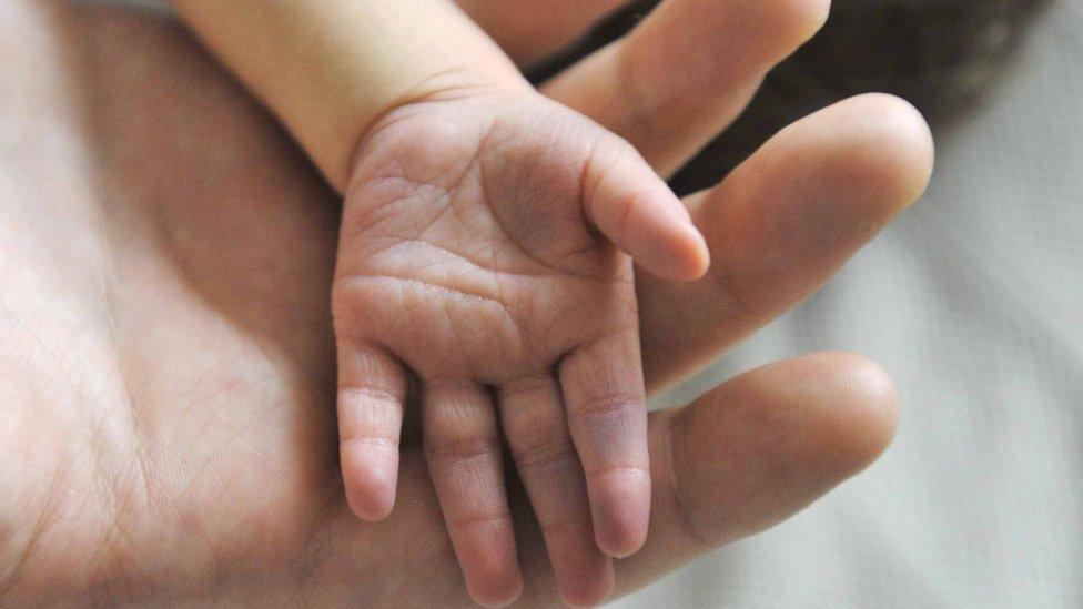 Newborn baby's hand