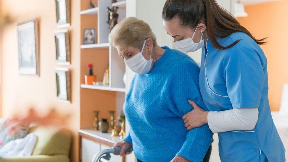 Care worker with elderly woman