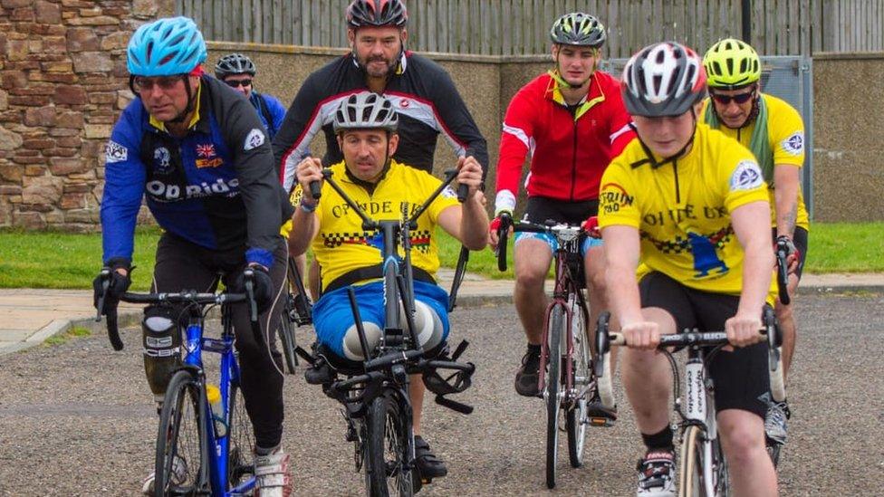 Ben Parkinson riding an adapted bike