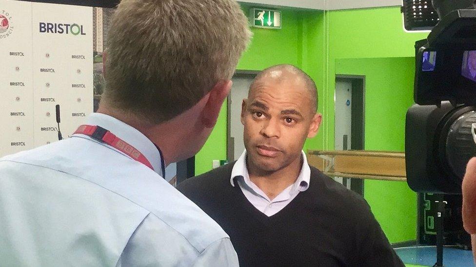 Bristol Mayor Marvin Rees talking to a TV reporter