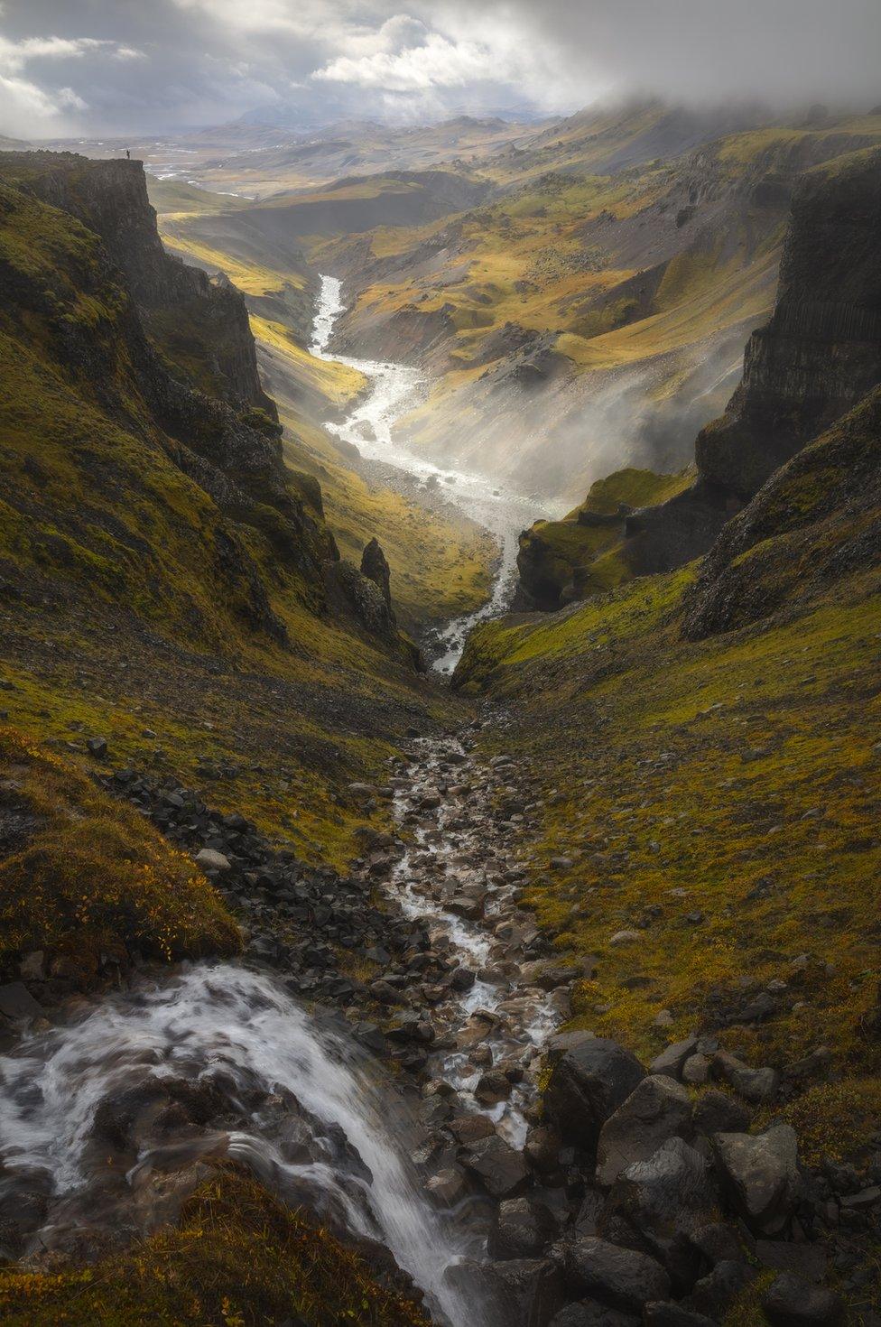 A landscape of a valley and a river at Haifoss, Iceland