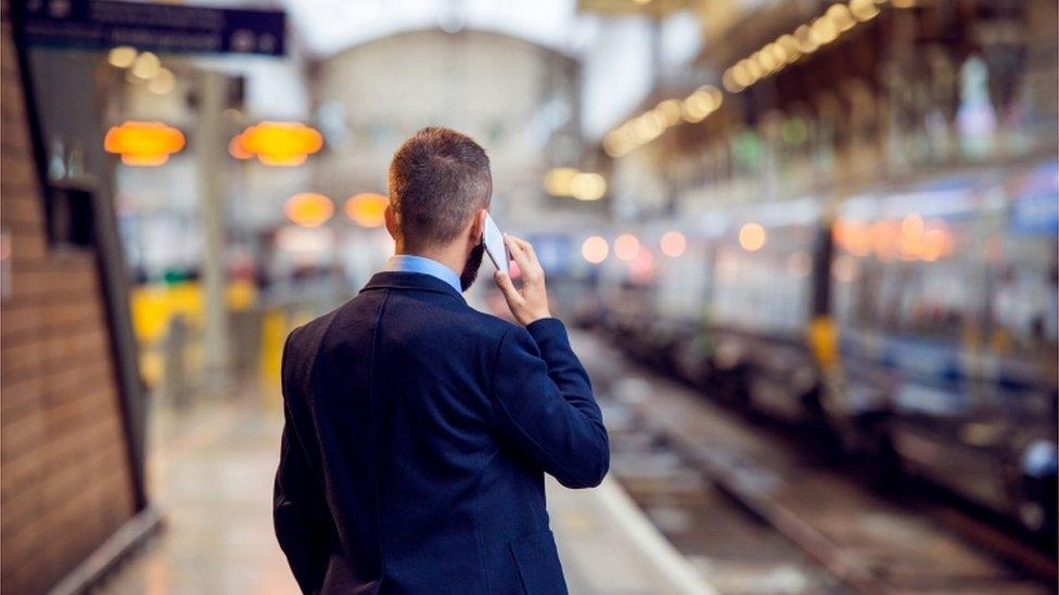 Commuter with phone