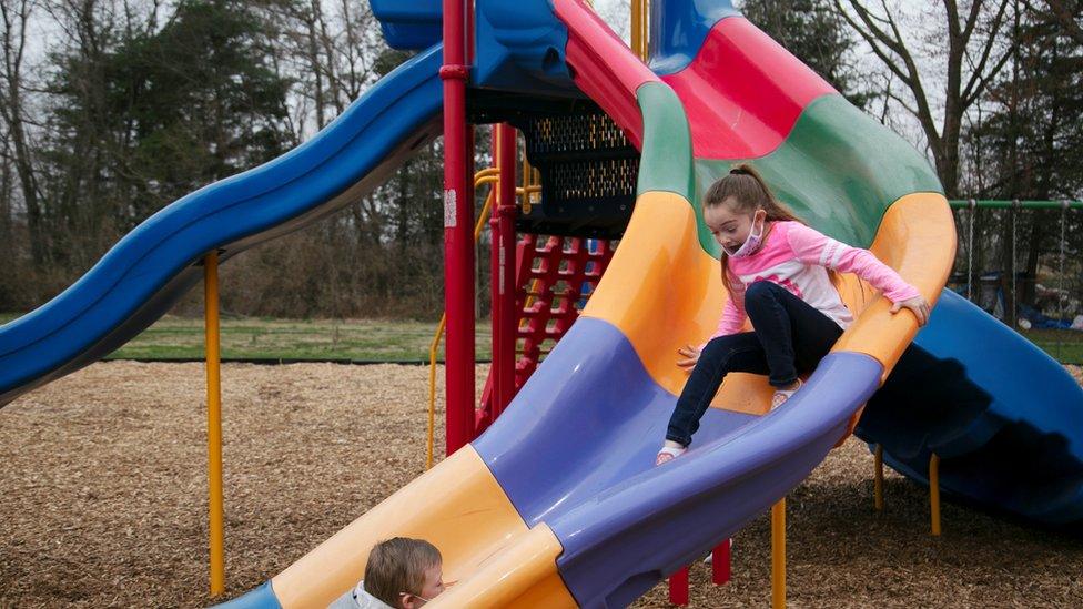 kids playing in playground.