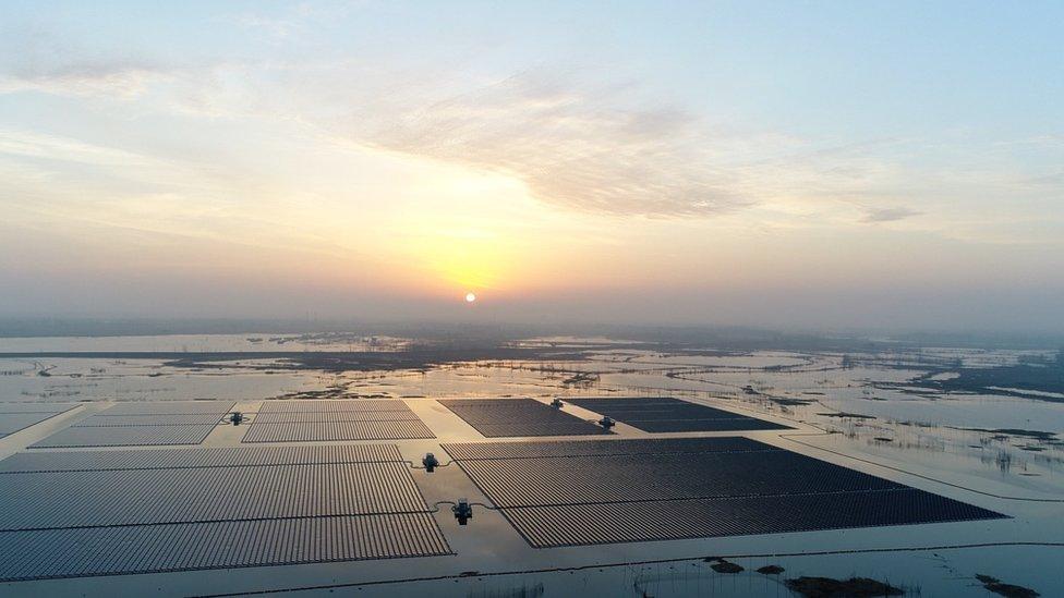 Sunrise over a huge floating solar farm in Anhui, China