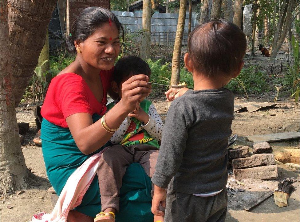 Shewali Boro with her toddler Riyan Chandra Boro