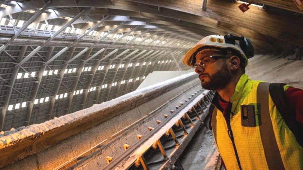 An operation worker checks urea production lines at Fertilizer giant Yara's plant in Le Havre, western France, on April 8, 2022.