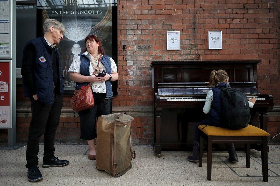 Malcolm Ingram, Jill Robinson and her daughter Katie Robinson at the Darlington piano