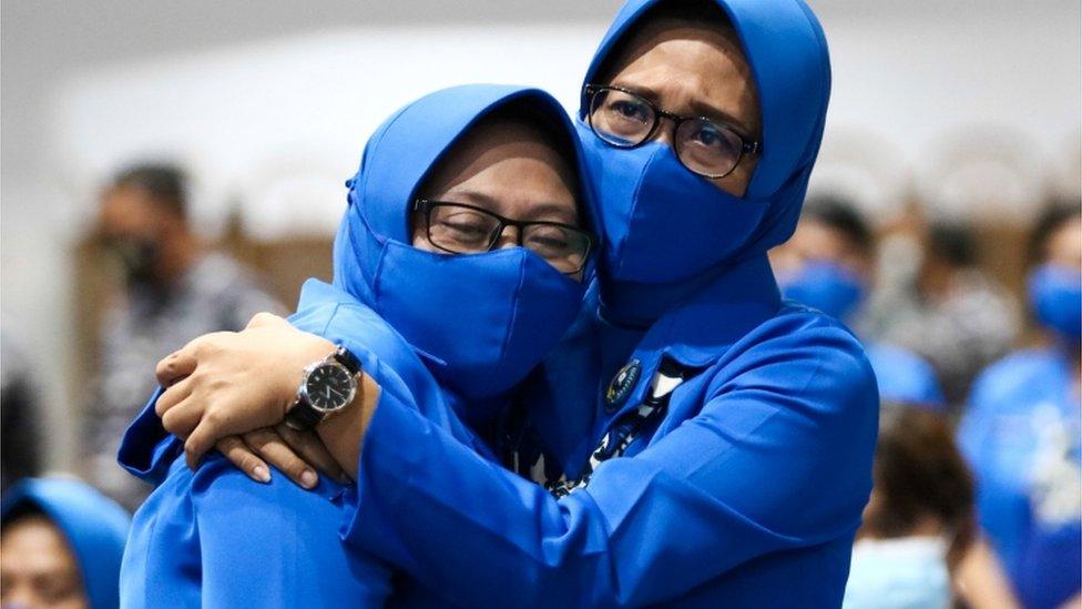 Family of missing crew at Koarmada II fleet office in Surabaya, East Java Province, Indonesia April 25 2021