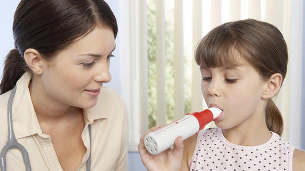 Doctor and a girl with asthma