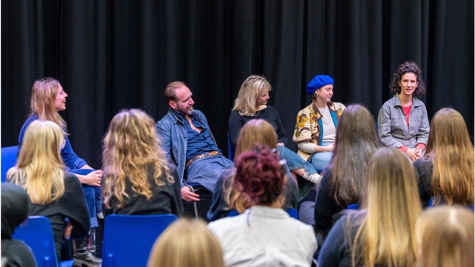 Ralph Fiennes and Indira Varma visit school