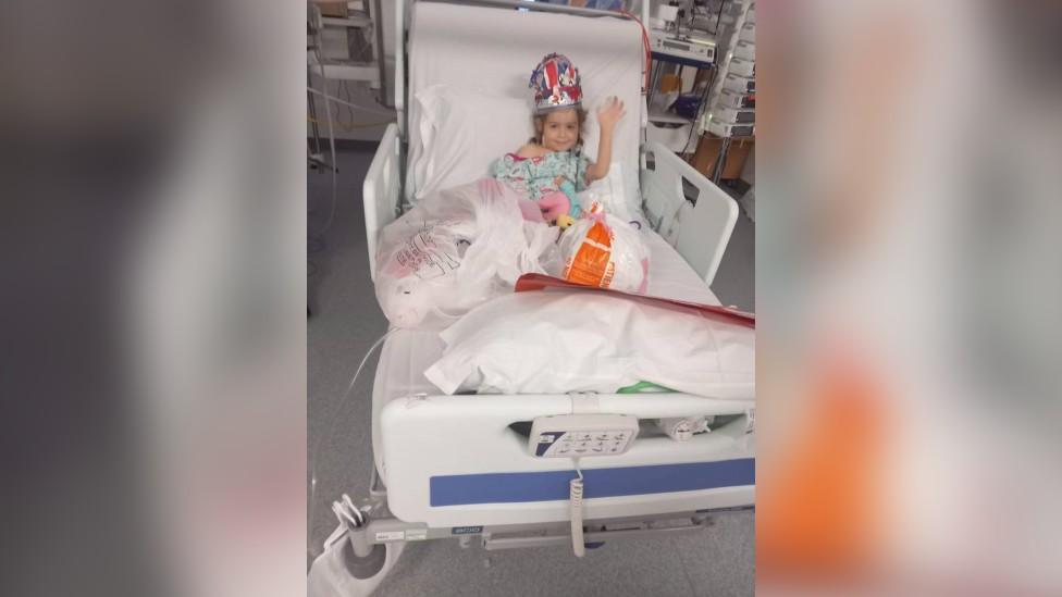 Poppy recovering in hospital following her transplant operation