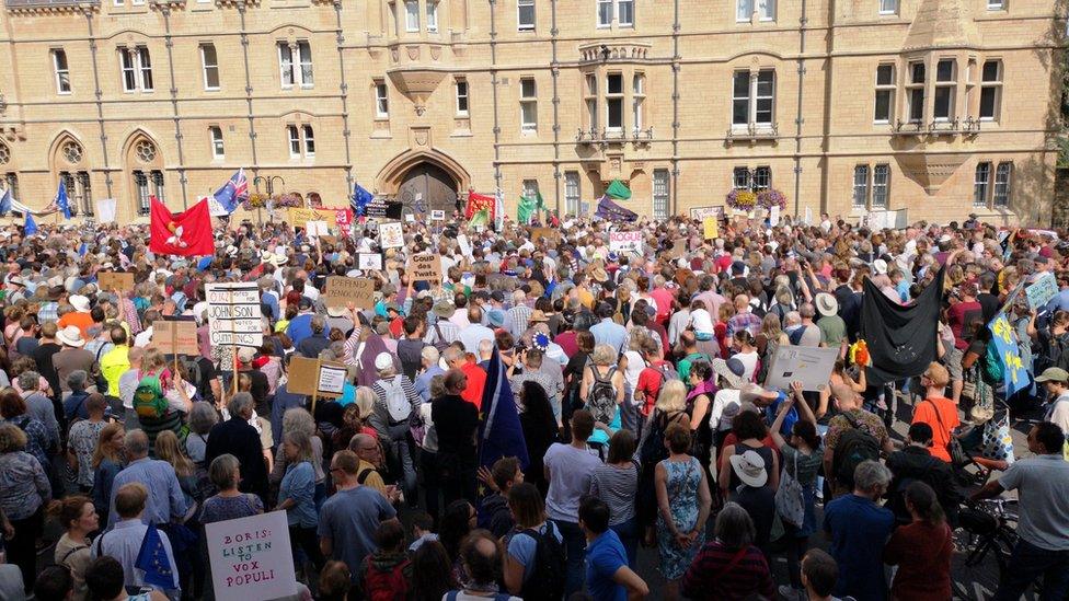 In Oxford, protesters gathered outside Mr Johnson's former Balliol College