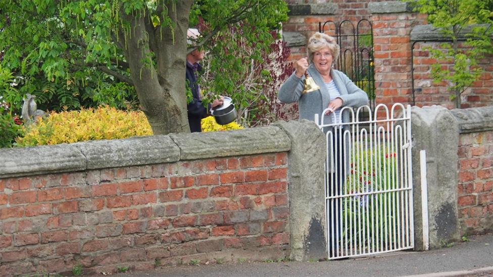 Villagers ringing bells for NHS