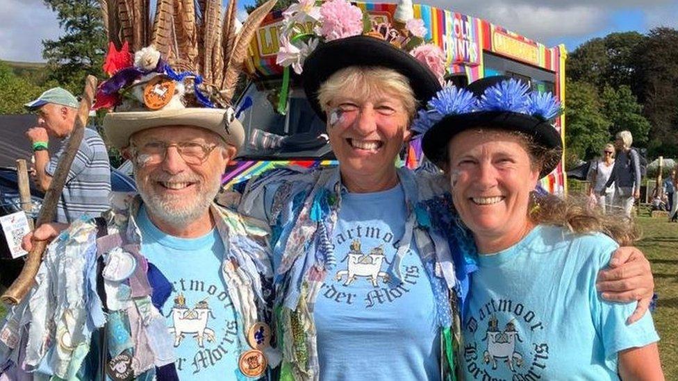 People at Widecombe Fair smiling